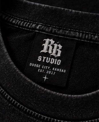 Woven neck label reading RB Studio Dodge City, Kansas Est. 2017